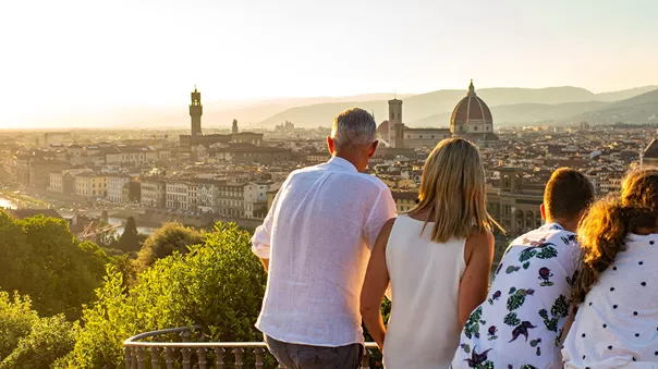 Travellers looking at Florence panorama, Italy