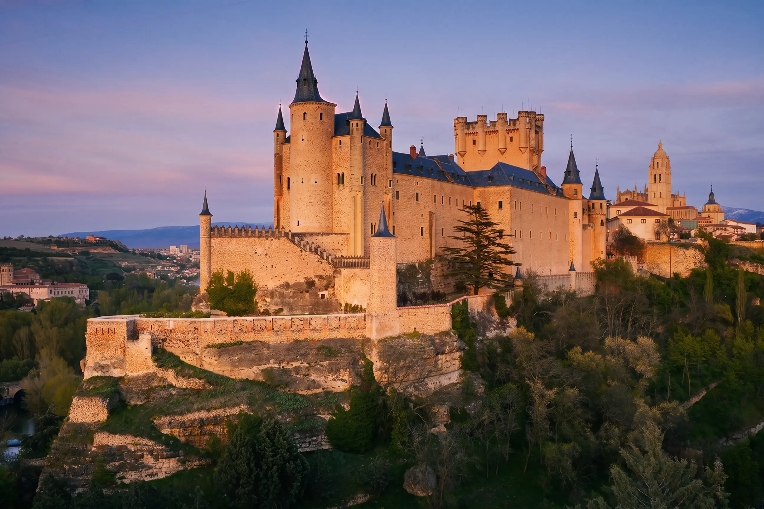 day-hero-segovia-castle-at-dusk-segovia-spain.webp