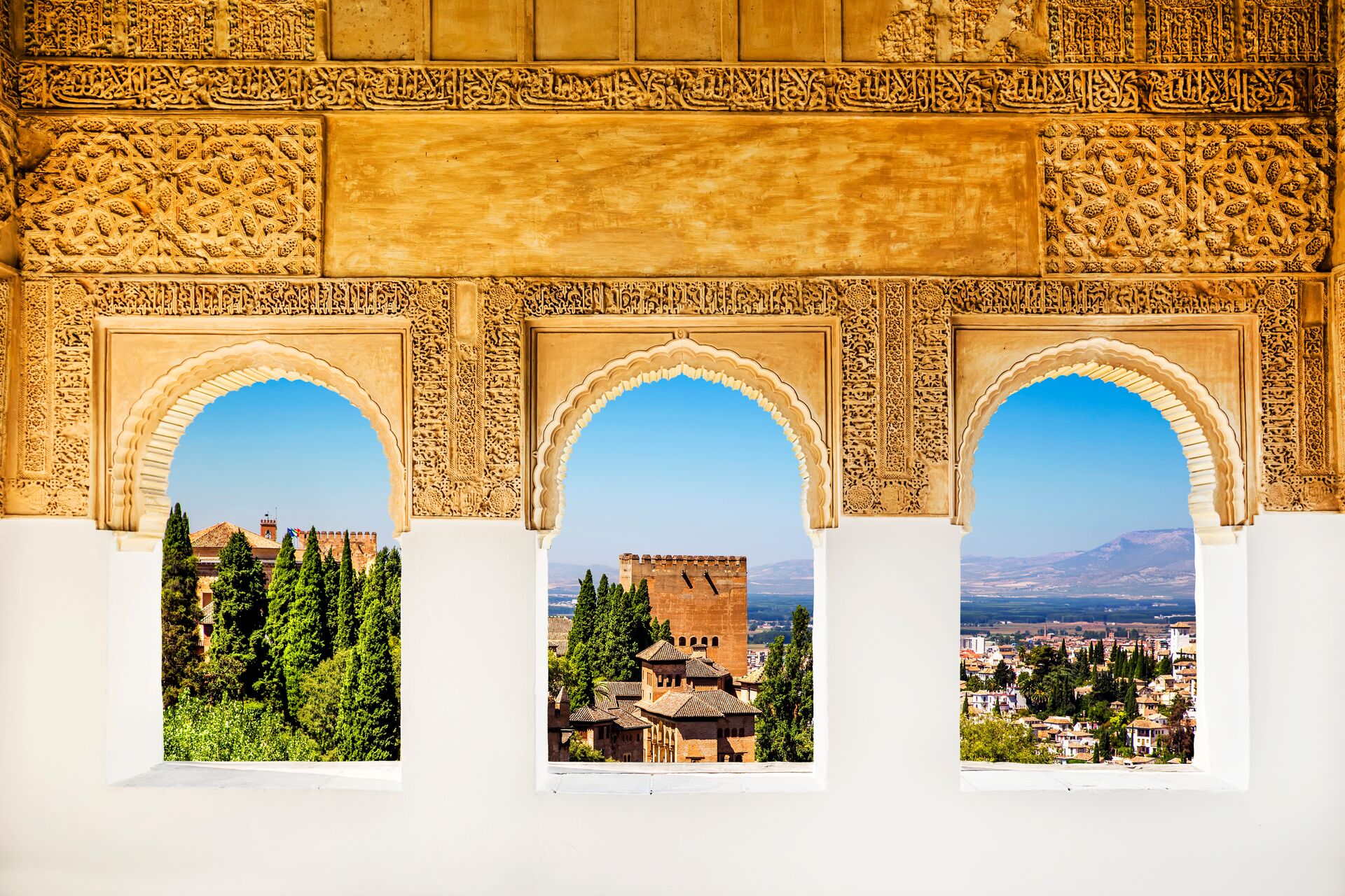 Through the windows of the Alhambra in Granada, Spain