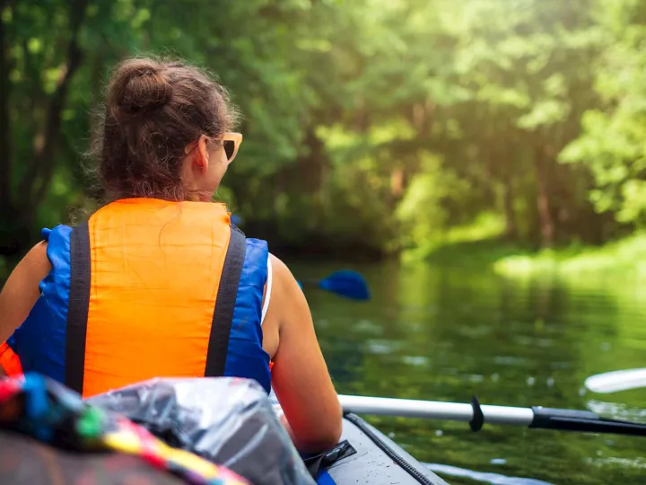 Woman kayaking Tortuguero National Park in Costa Rica