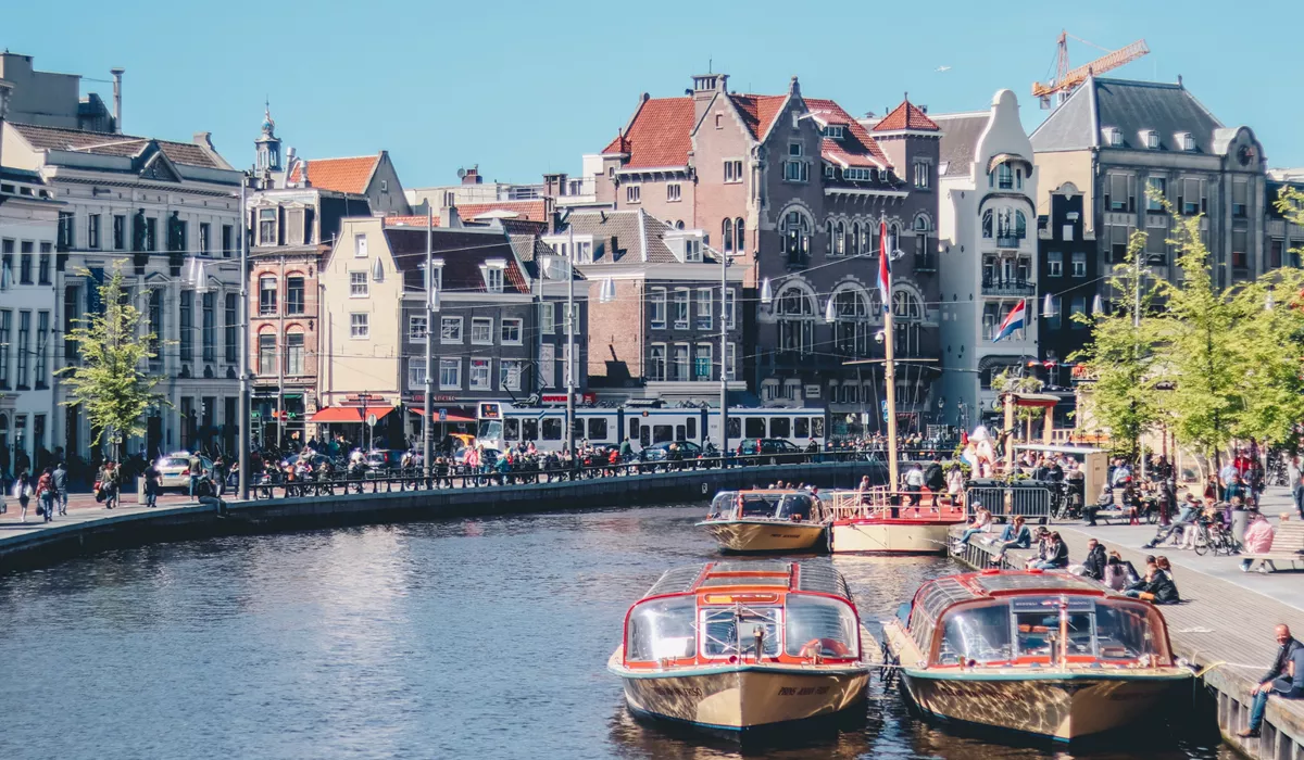 Boats afloat on one of Amsterdam's canals
