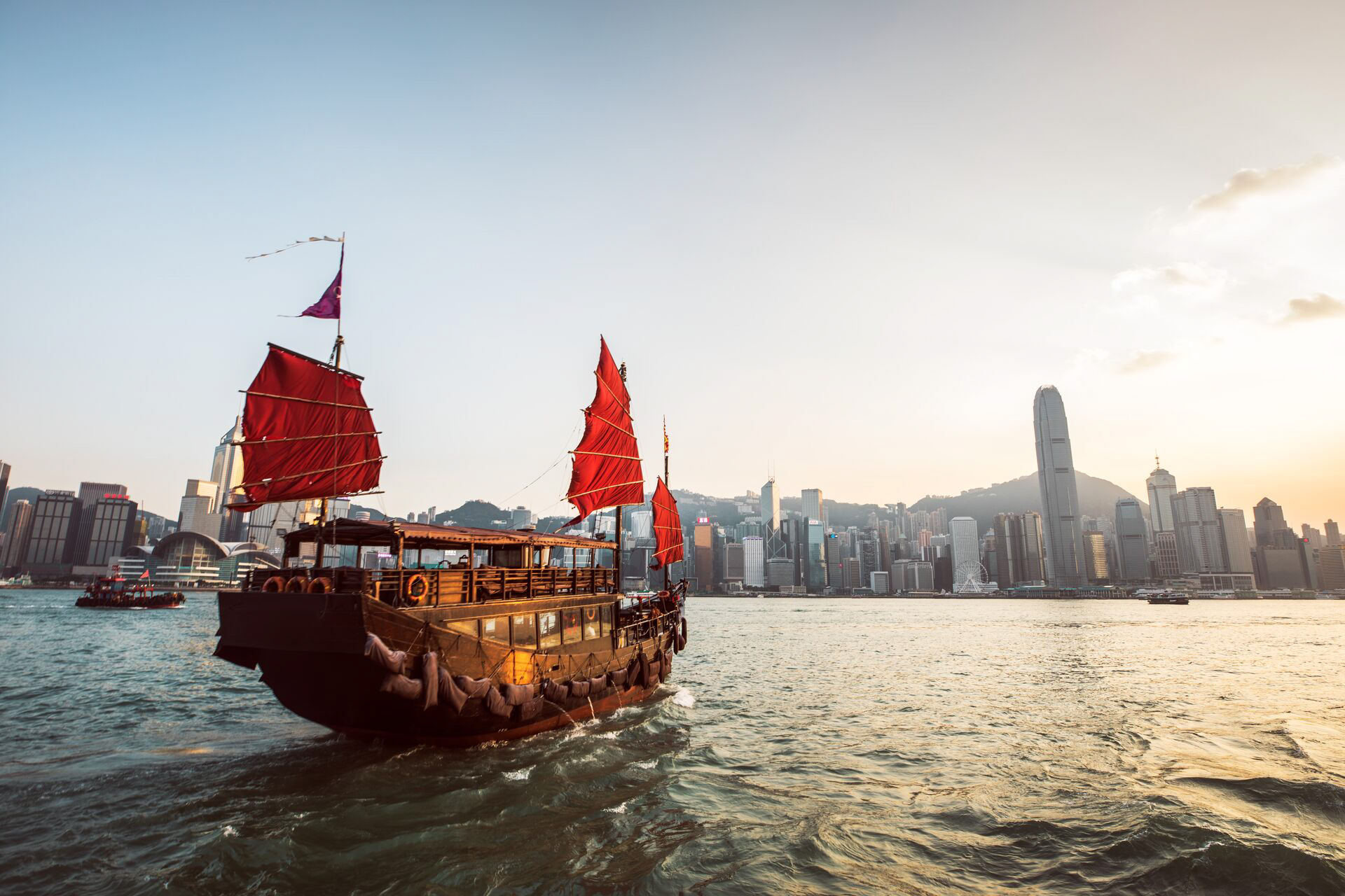 Traditional Junk Boat At The Victoria Harbour, Hong Kong