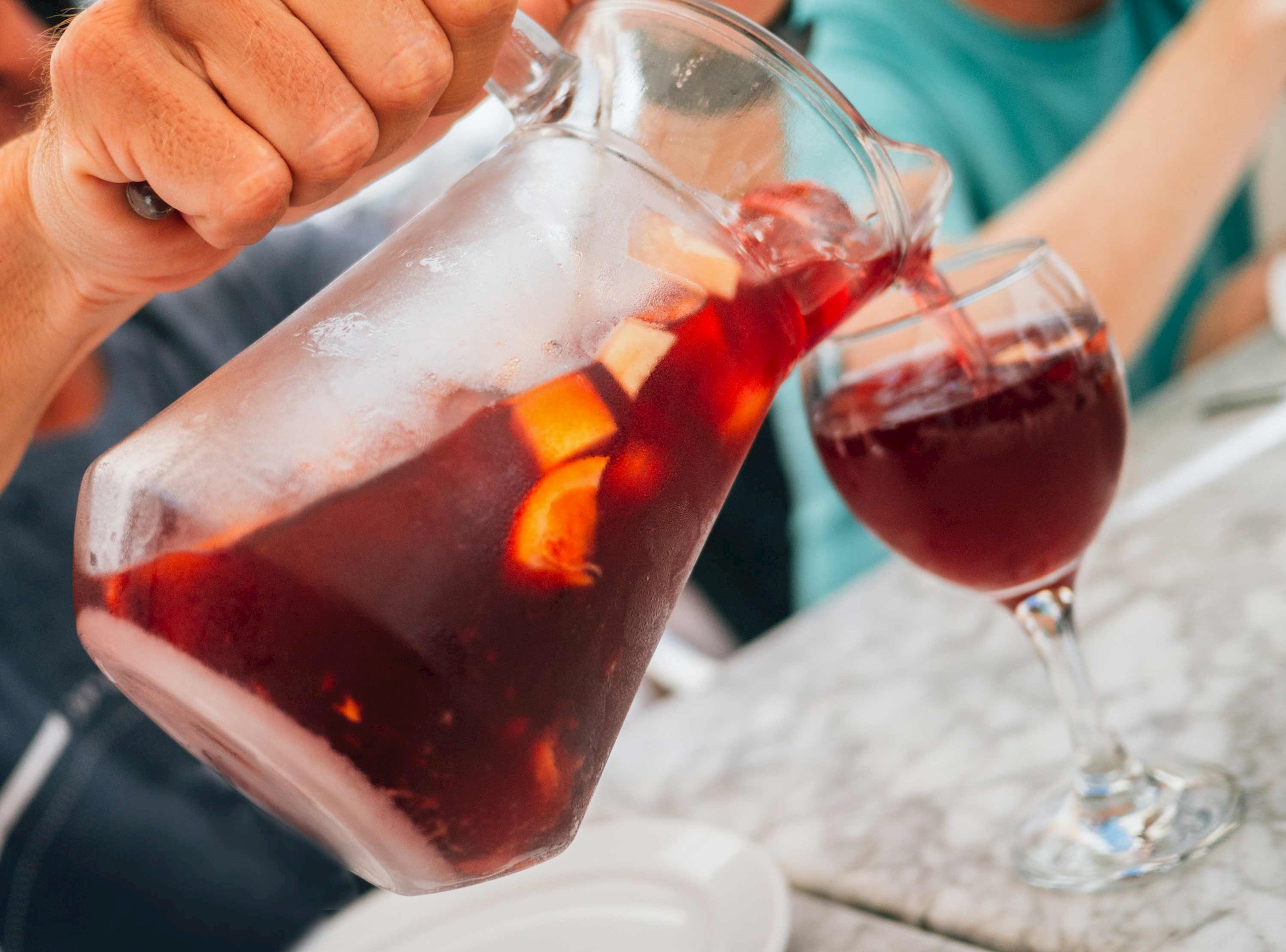 A pitcher of Sangria poured into a glass in Pamplona, Spain