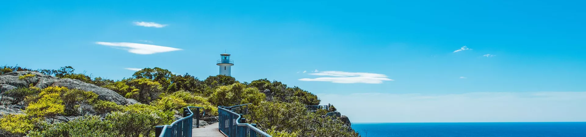 Path to Cape Tourville Lighthouse in Tasmania on a sunny day in Australia
