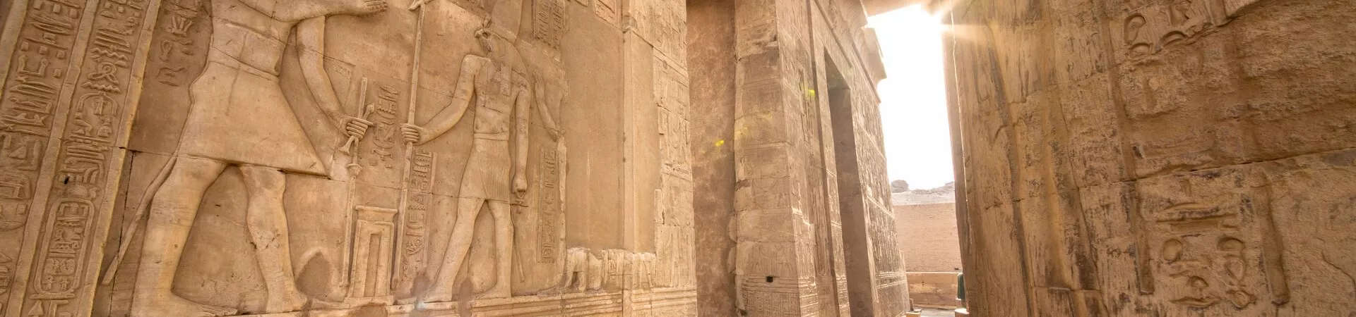 Egypt Temple of Kom Ombo entrance with sunlight pouring through
