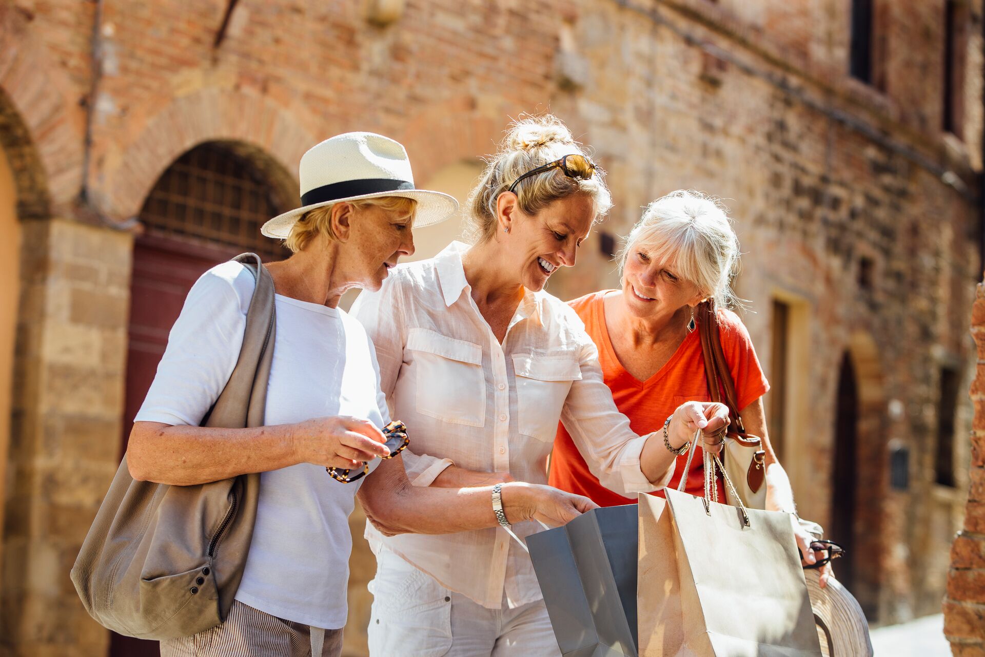 3 women sharing their souvenirs