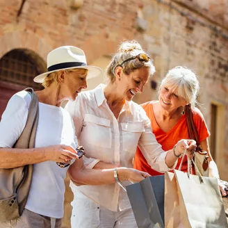 3 women sharing their souvenirs