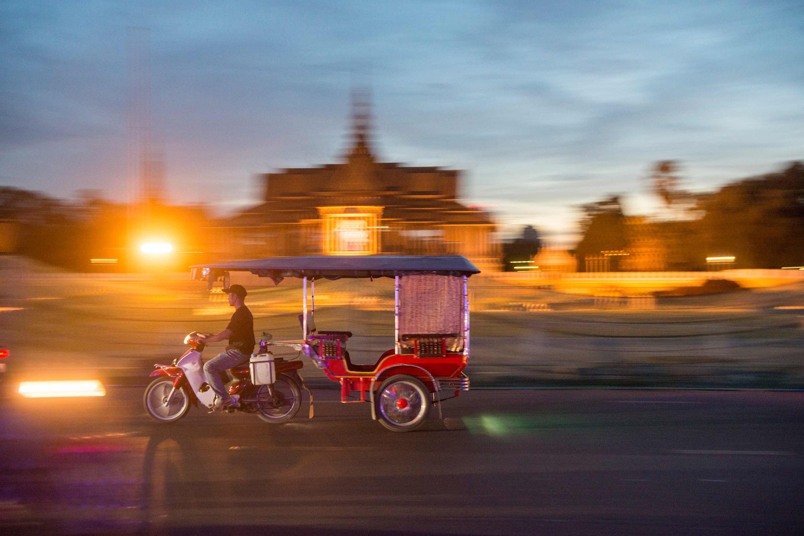 Tuk Tuk riding in the night time in Phnom Penh, Cambodia
