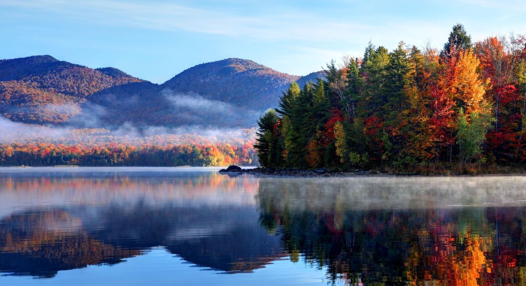 autumn-reflection-in-scenic-vermont-485083256.jpg