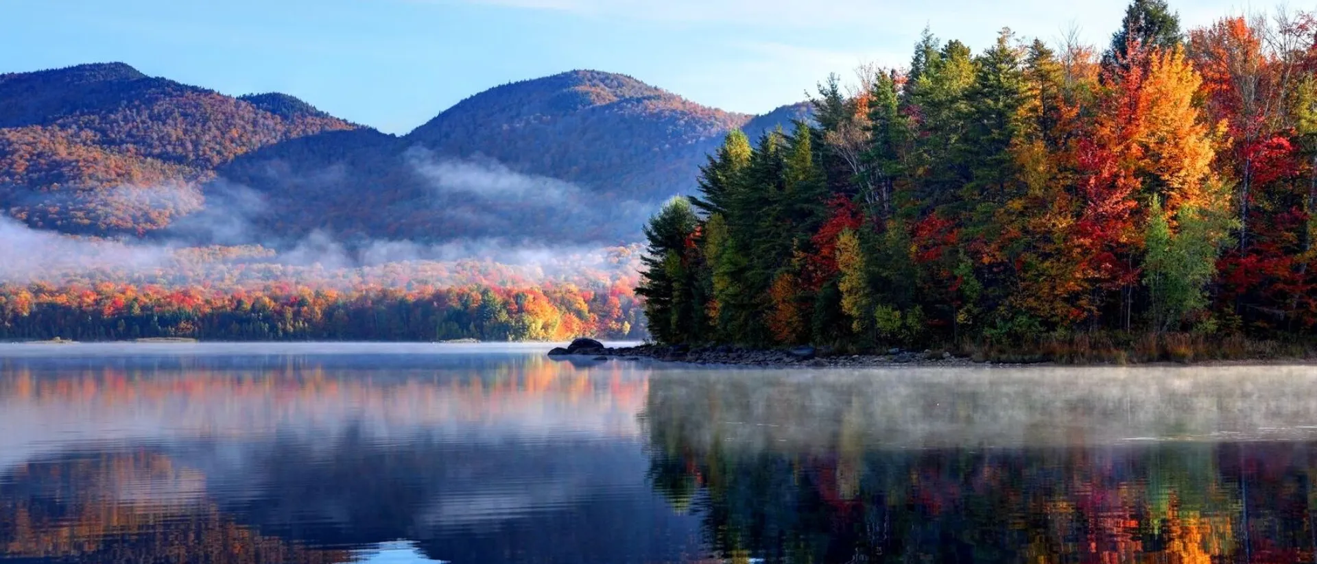 autumn-reflection-in-scenic-vermont-485083256.jpg