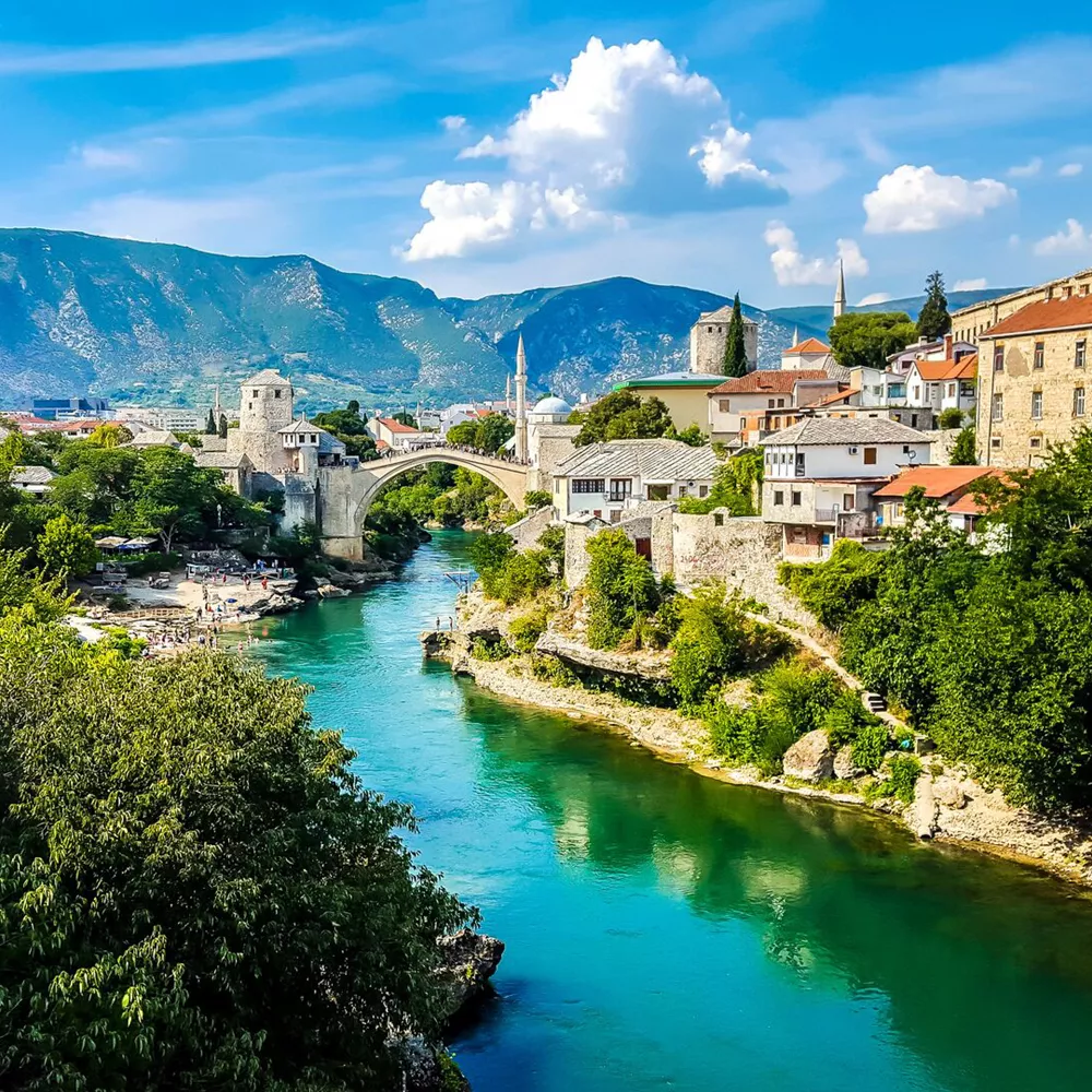 Old Bridge In Mostar Crossed By The River Neretva