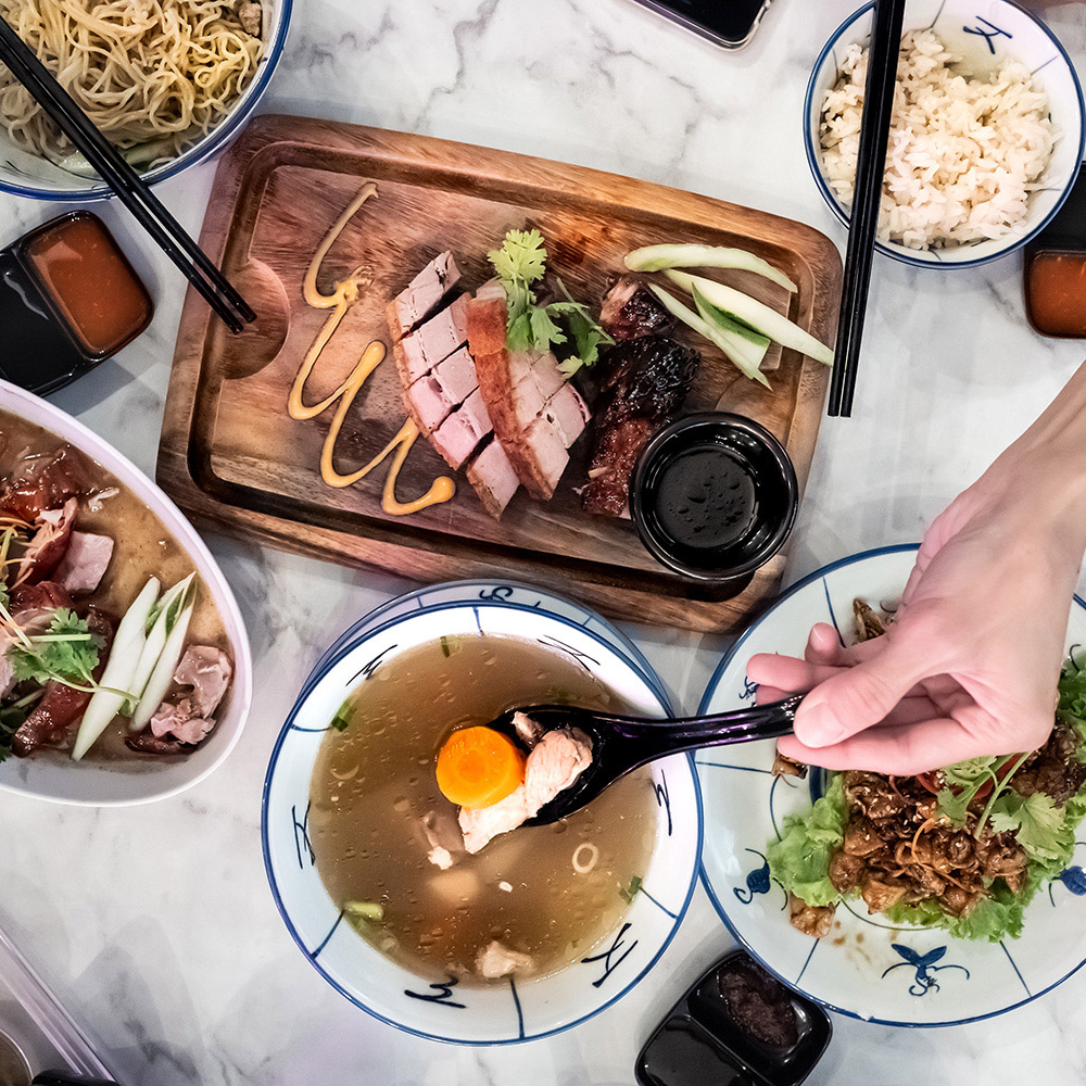 Singapore dishes presented on the table