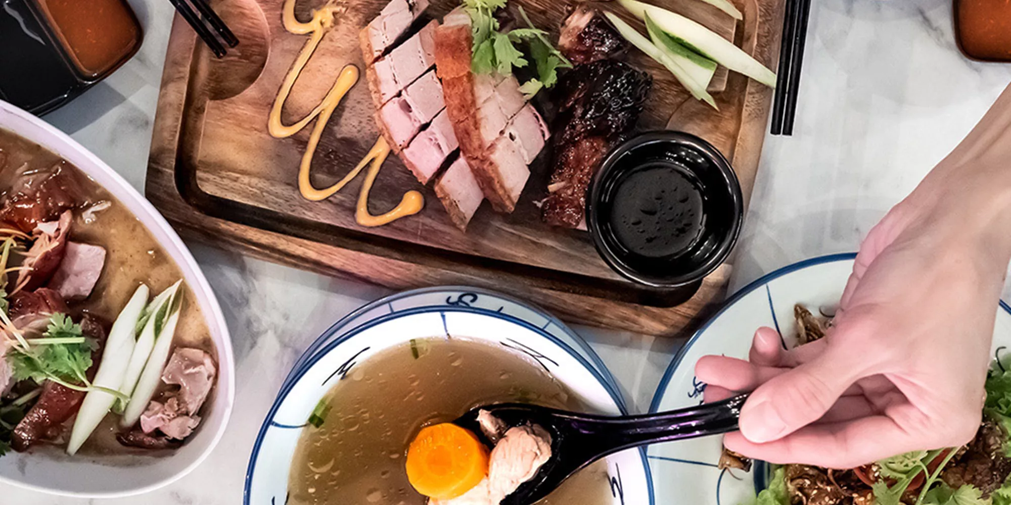 Singapore dishes presented on the table