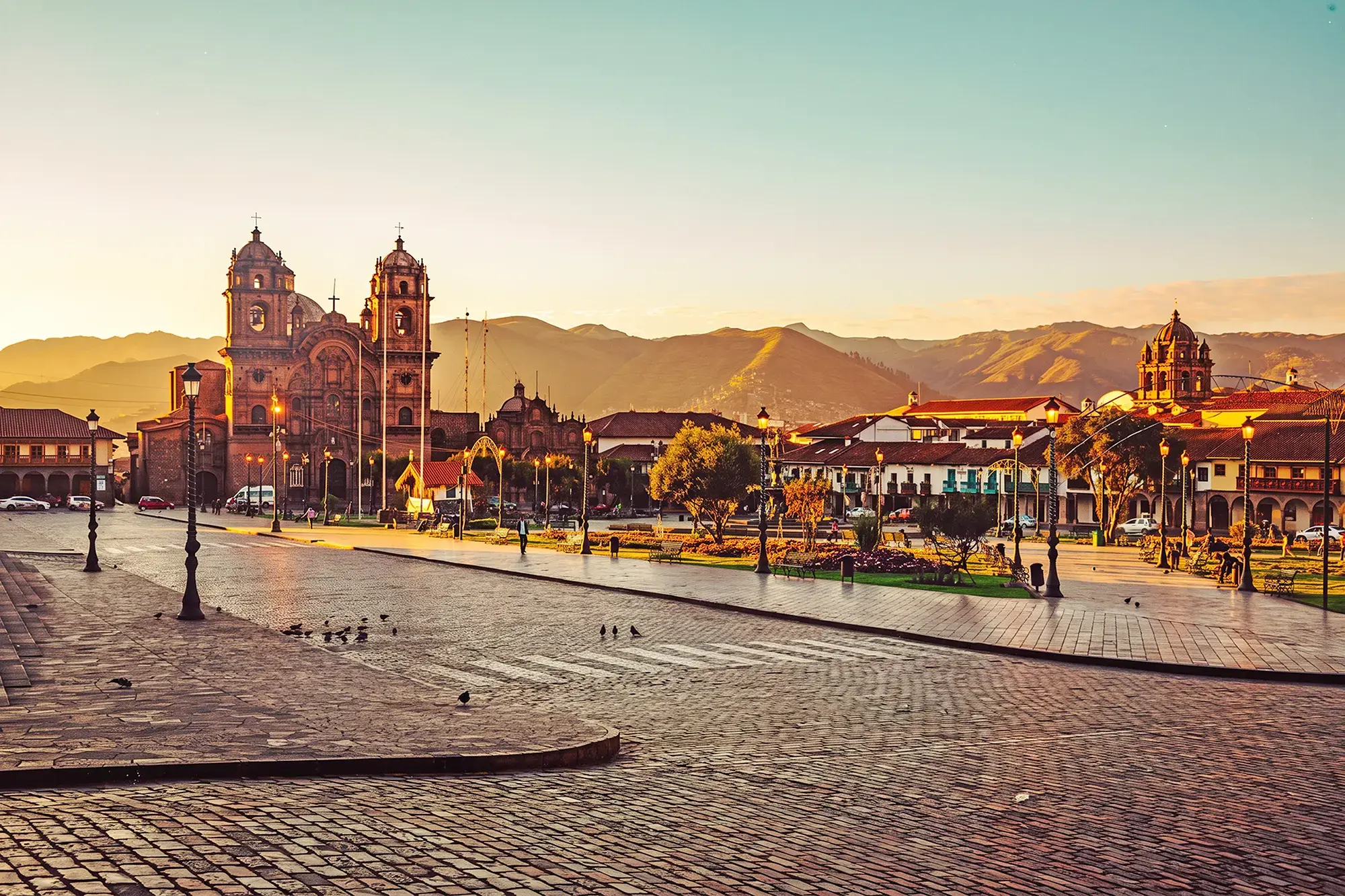 day-hero-golden-sunrise-over-the-cusco-plaza-de-armas-peru-2193885193.webp
