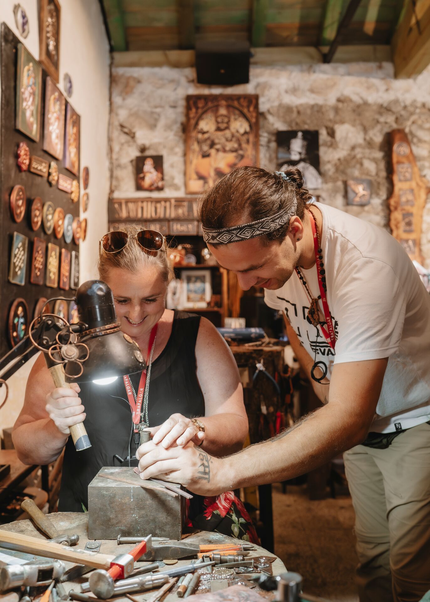 A woman takes part in a copper workshop