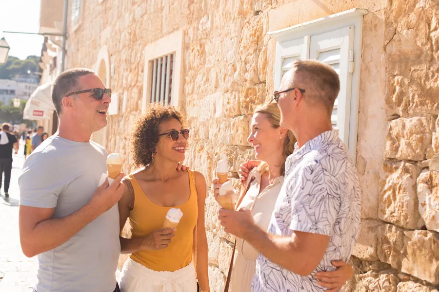 Guests enjoying ice-cream on a sunny day in Hvar, Croatia