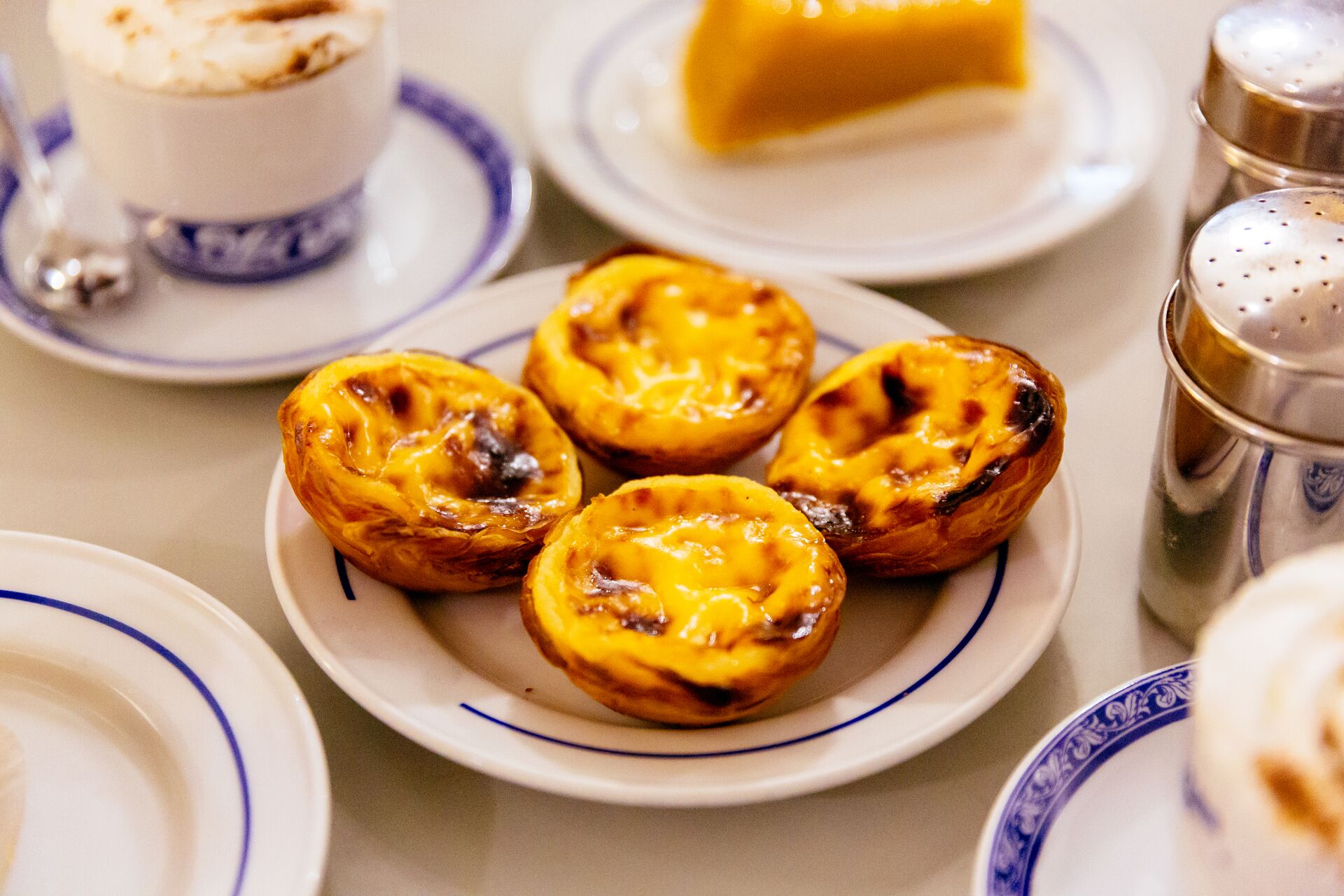 Pasteis de nata, traditional Portuguese pastry on a plate