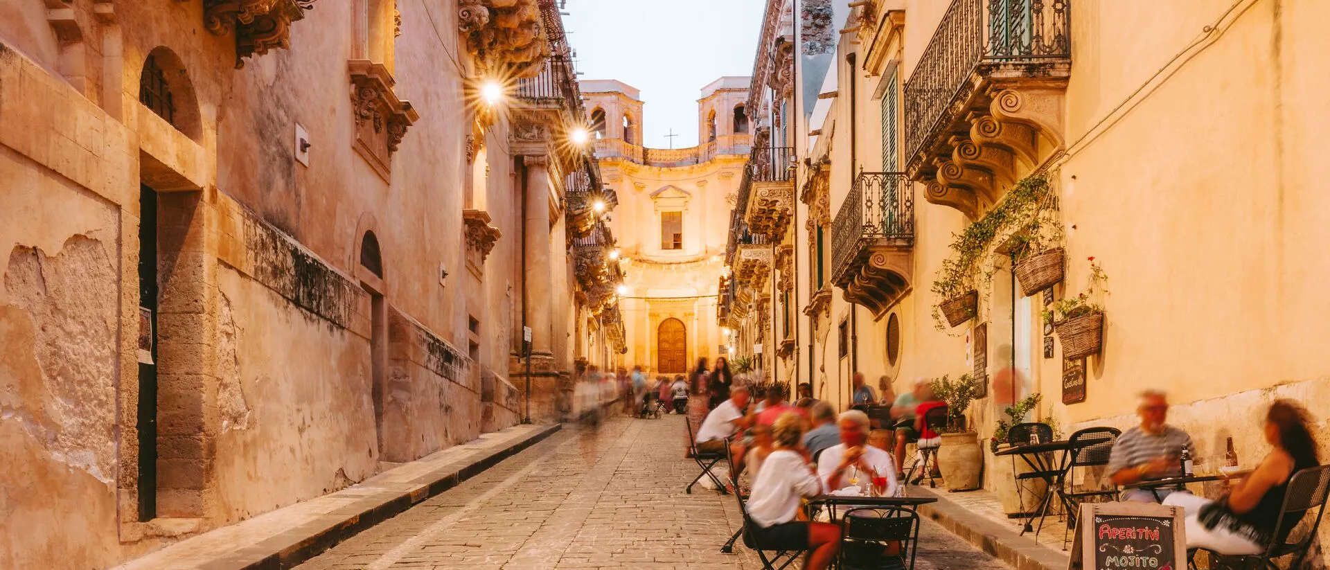 people-dining-outside-noto-italy.jpeg
