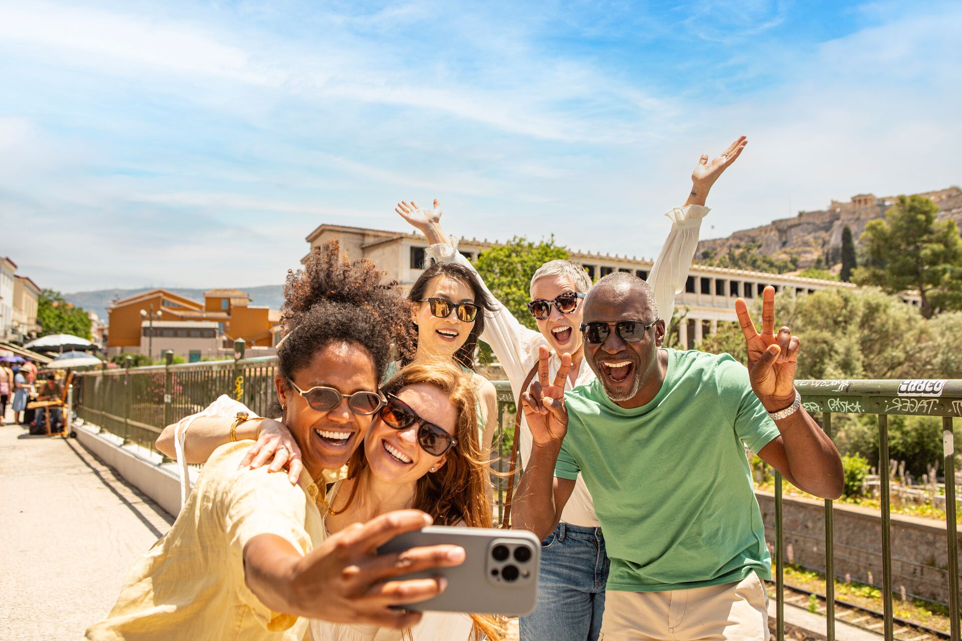 Guests taking a selfie while sightseeing in Athens, Greece