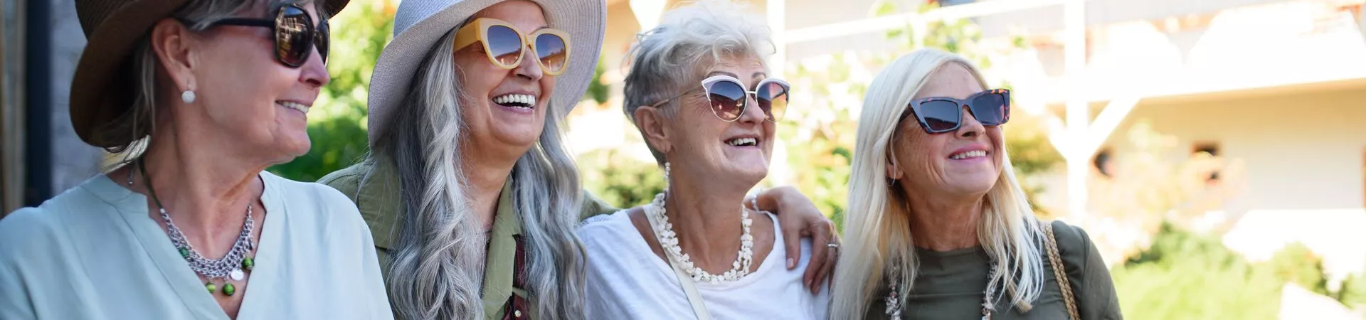 A group of women with sunglasses on