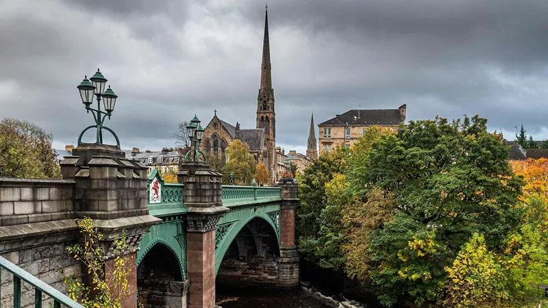Kelvin Bridge and the Lansdowne Parish Church in the background in Glasgow, Scotland