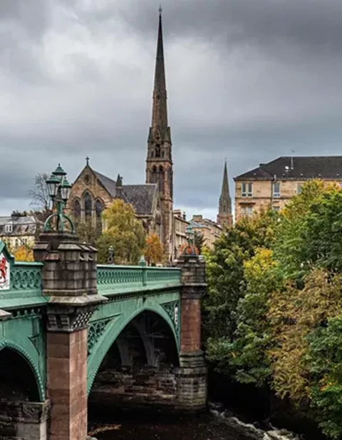 Kelvin Bridge and the Lansdowne Parish Church in the background in Glasgow, Scotland
