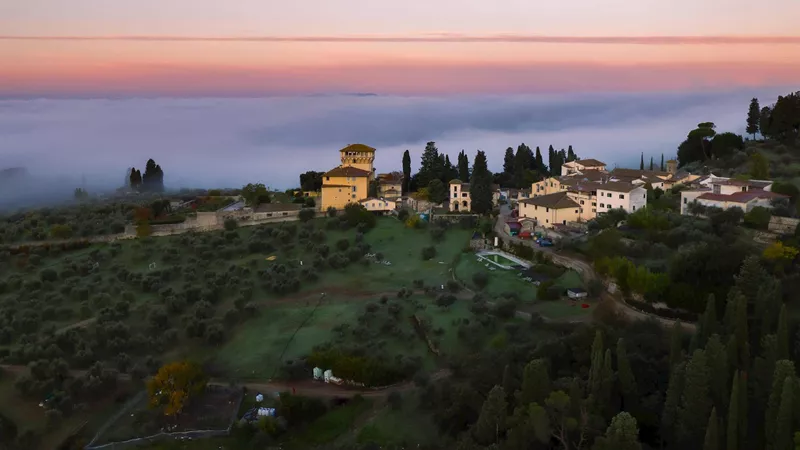 Local Tuscan dinner with Count Miari Fulcis on his 15th-century organic olive oil estate in the Tuscan hills
