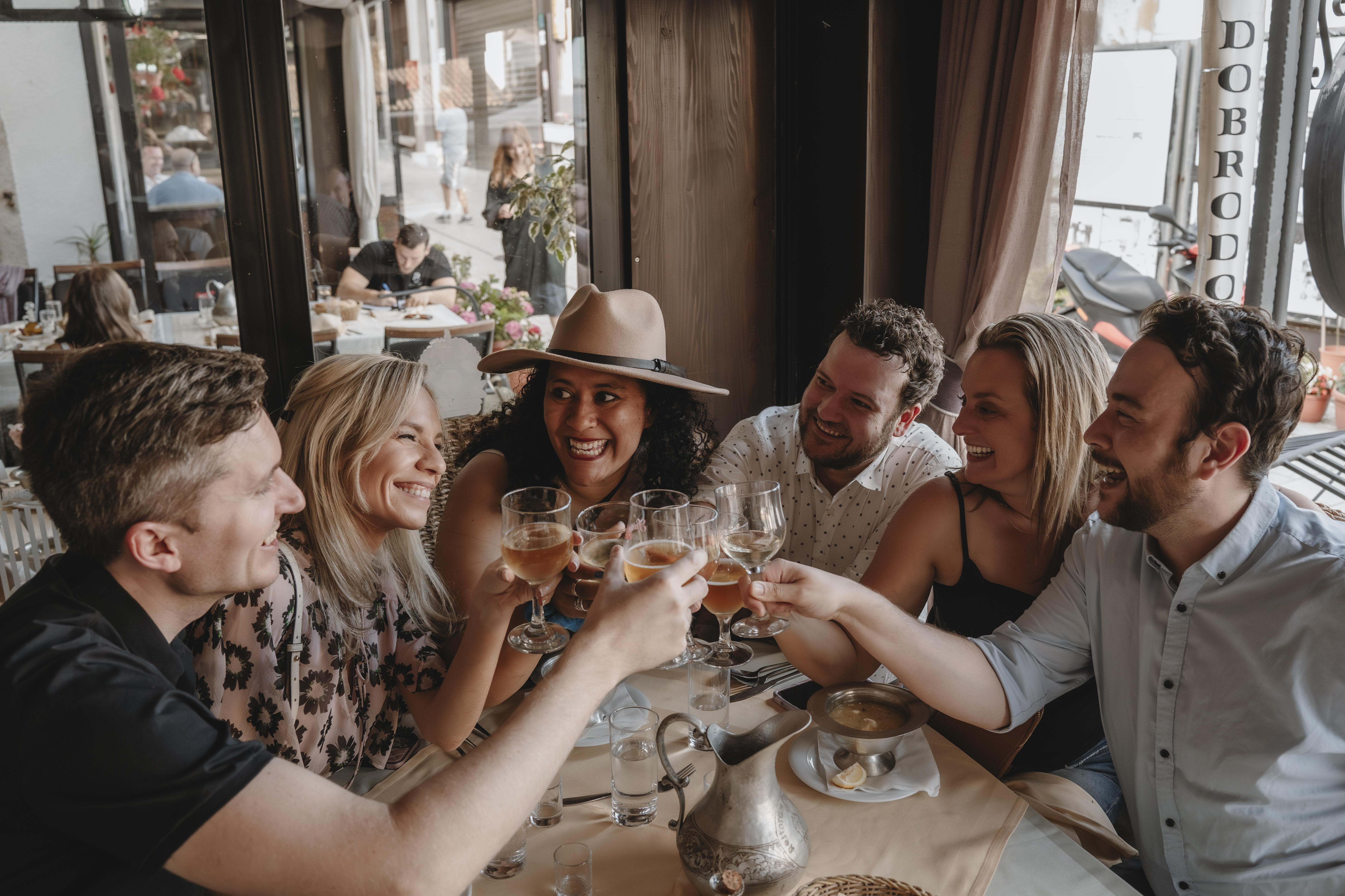 Group of tourists laughing while on holiday in the Balkans