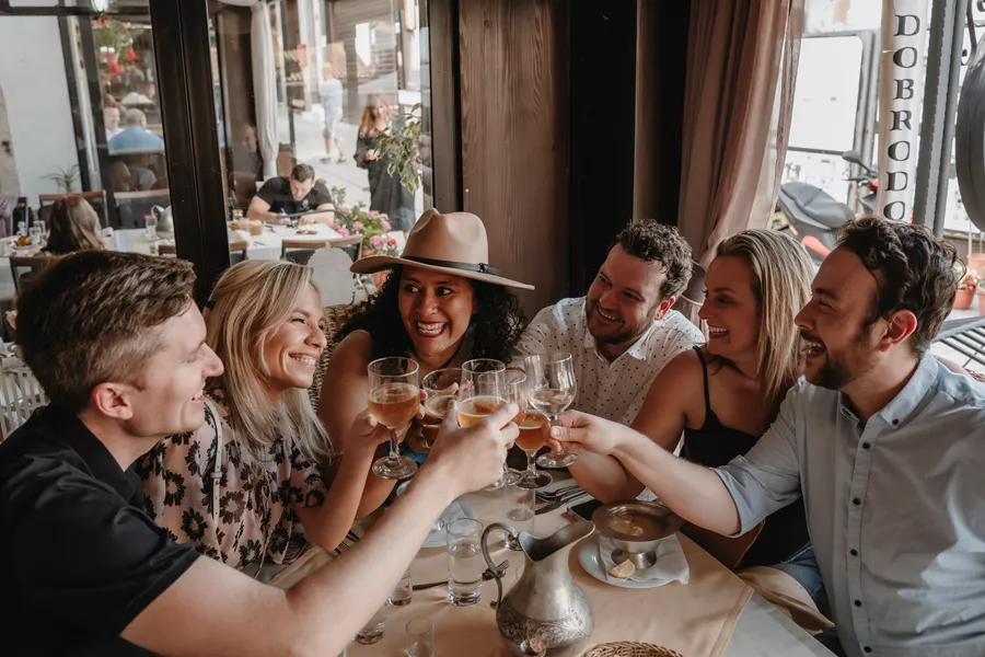 Group of tourists laughing while on holiday in the Balkans