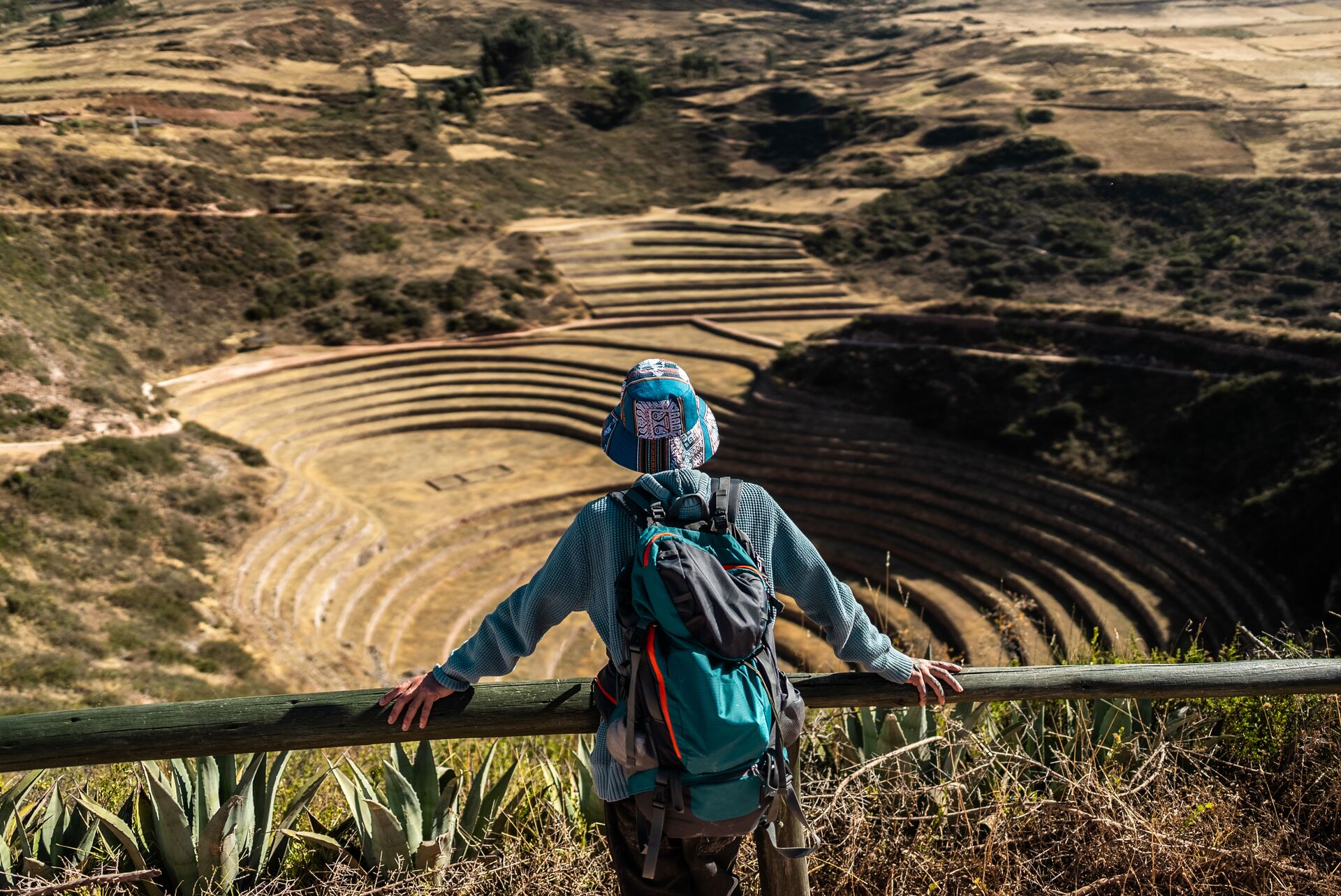 Middle-aged solo traveller enjoying beautiful views on a mountain in Peru
