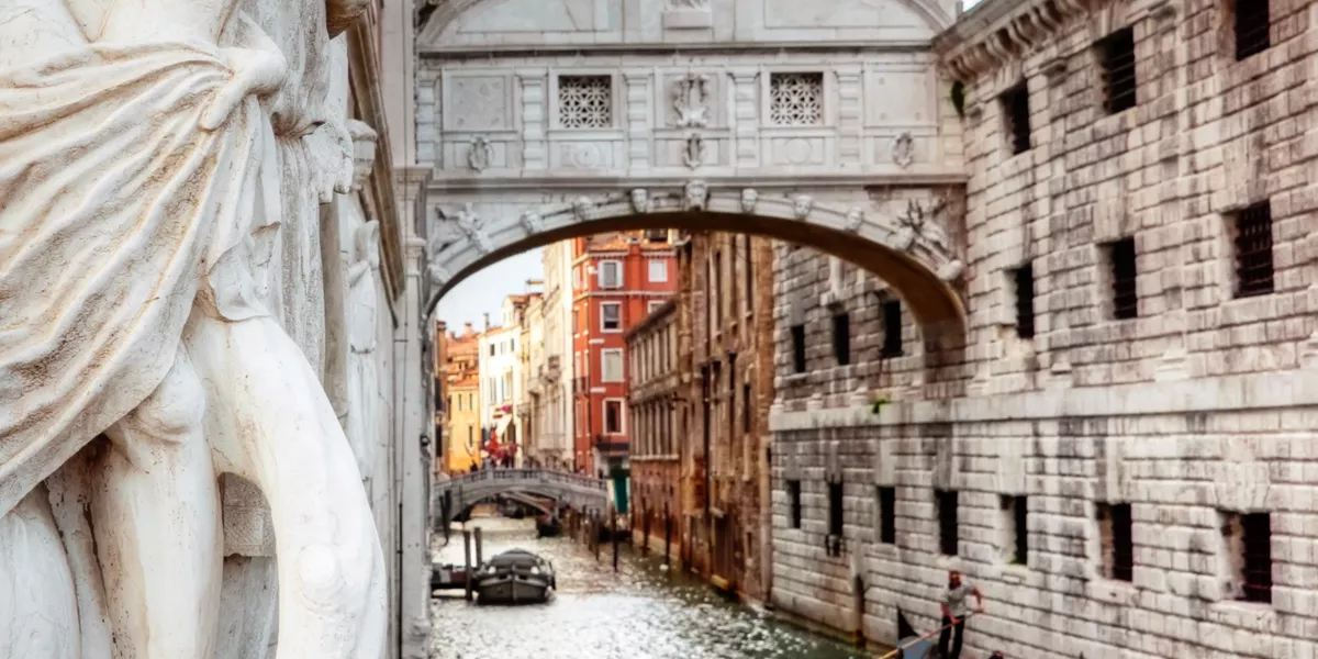 Gondols flowing through the canals of Venice
