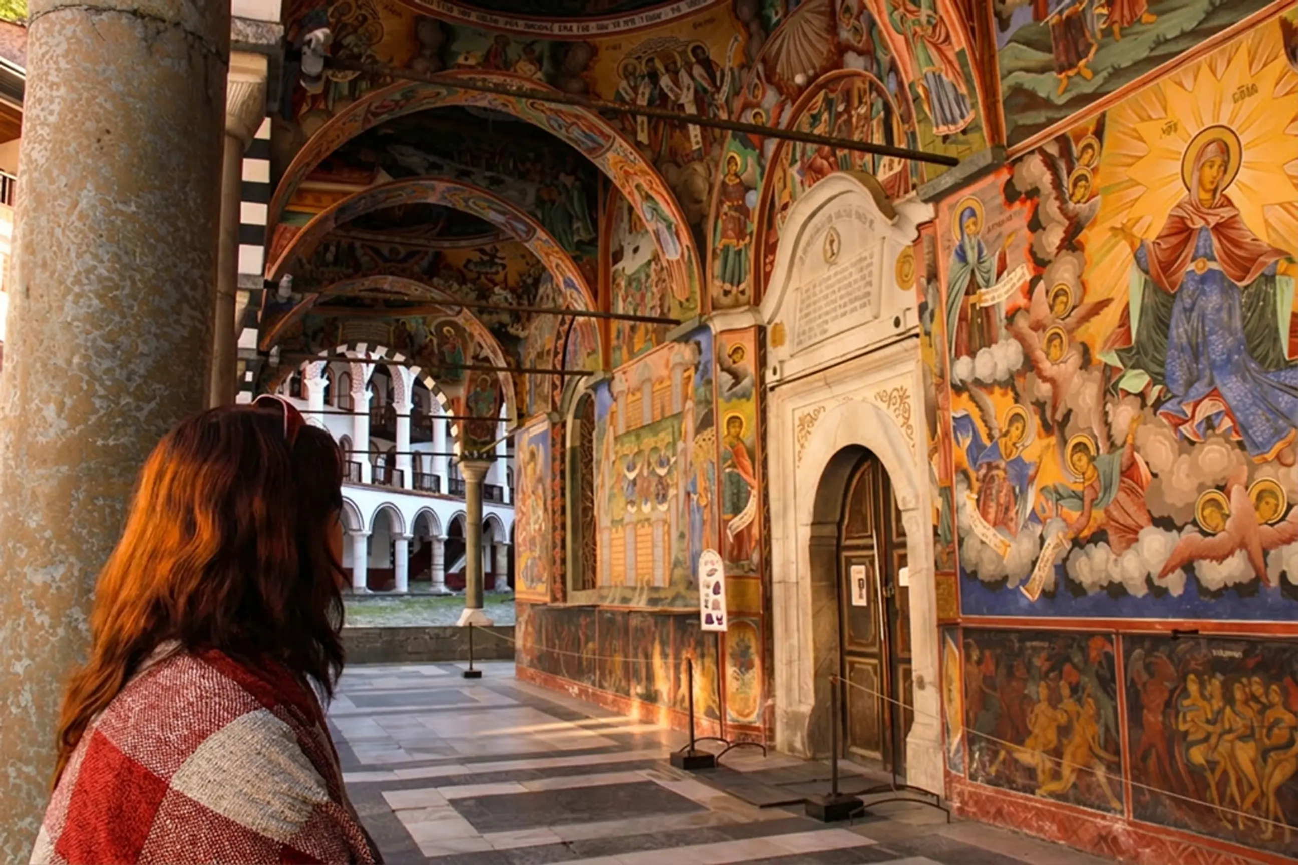day-hero-woman-rila-monastery-sofia-bulgaria.webp