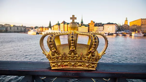 Skeppsholmsbron Bridge With Golden Crown In The Foreground, Stockholm, Sweden