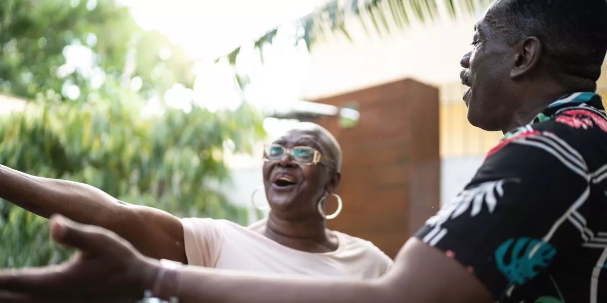 Two people laughing together