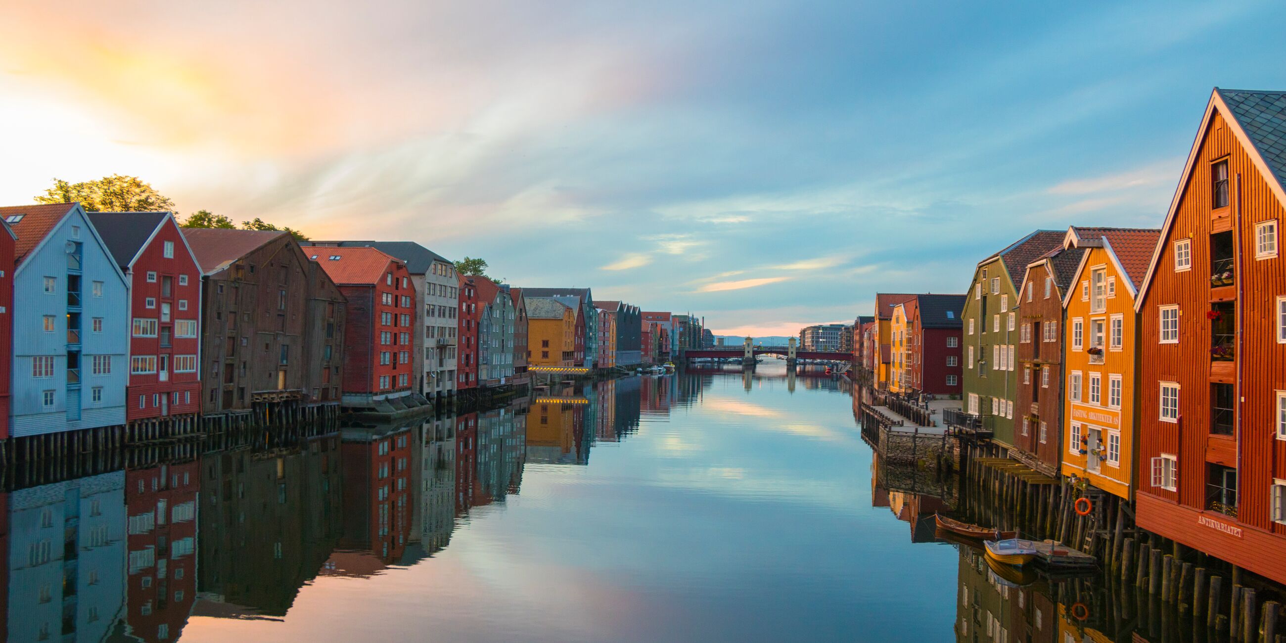 Reflection Of Buildings In Canal Against Sky 1181375290