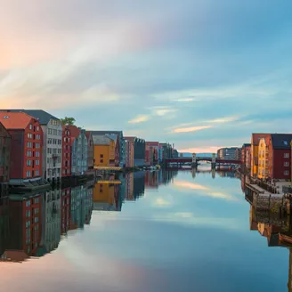 Reflection Of Buildings In Canal Against Sky 1181375290
