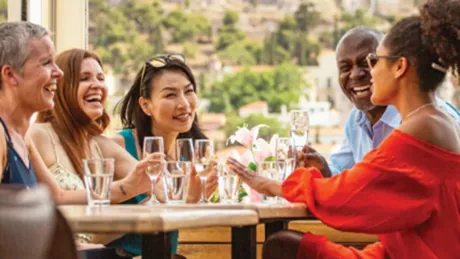 Guests Seating At Table Cheerfully Talking Rome