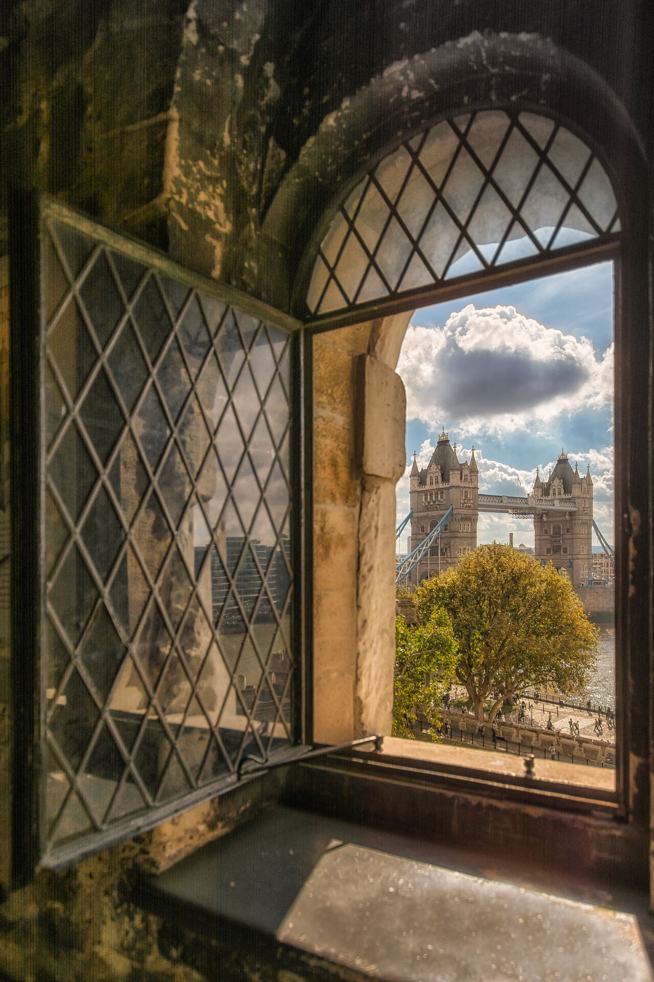 Portrait Of Tower Bridge From An Old Window At Tower Of London