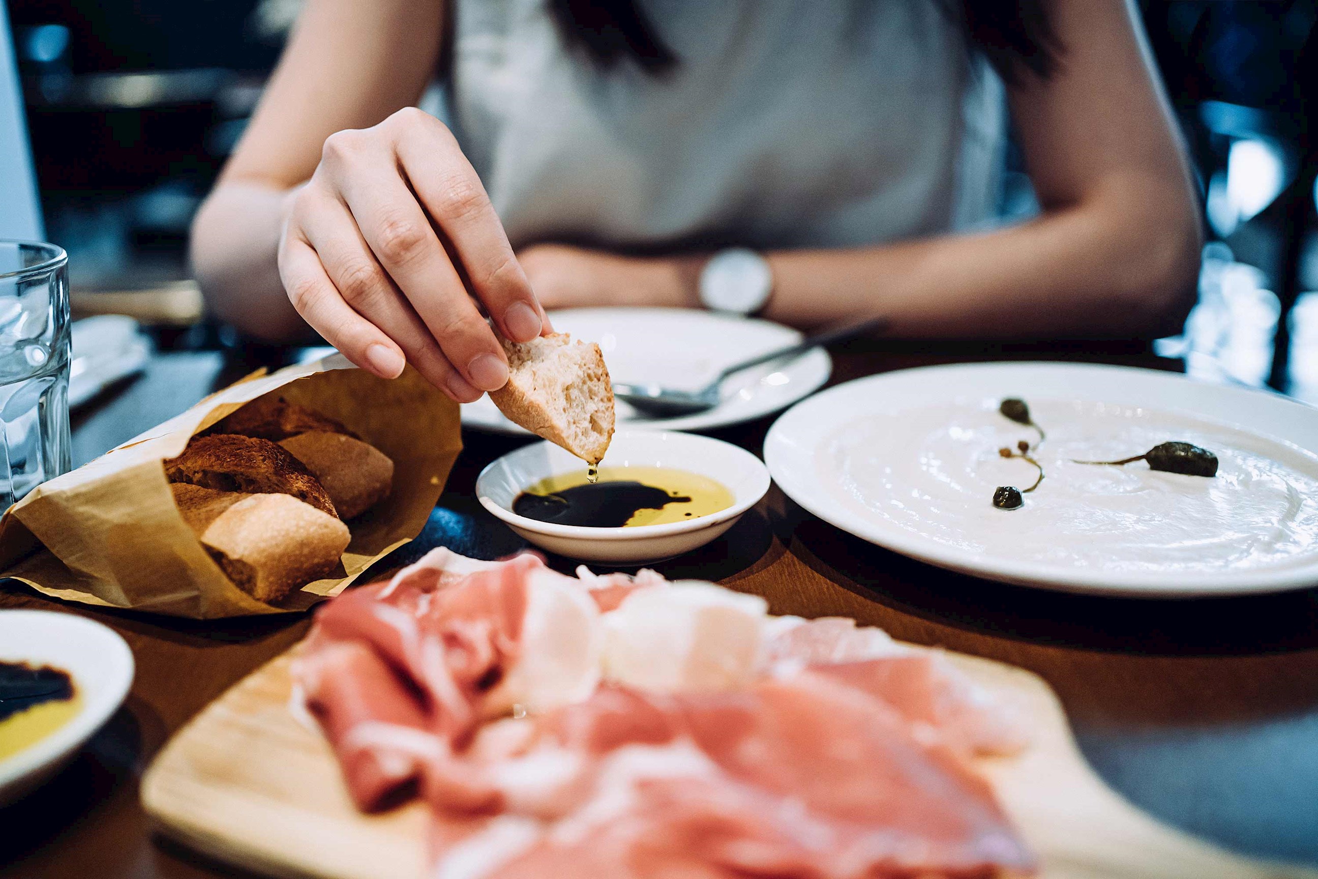 eating-bread-oil-modena-italy.jpg