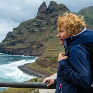 Woman exploring an island on a windy day