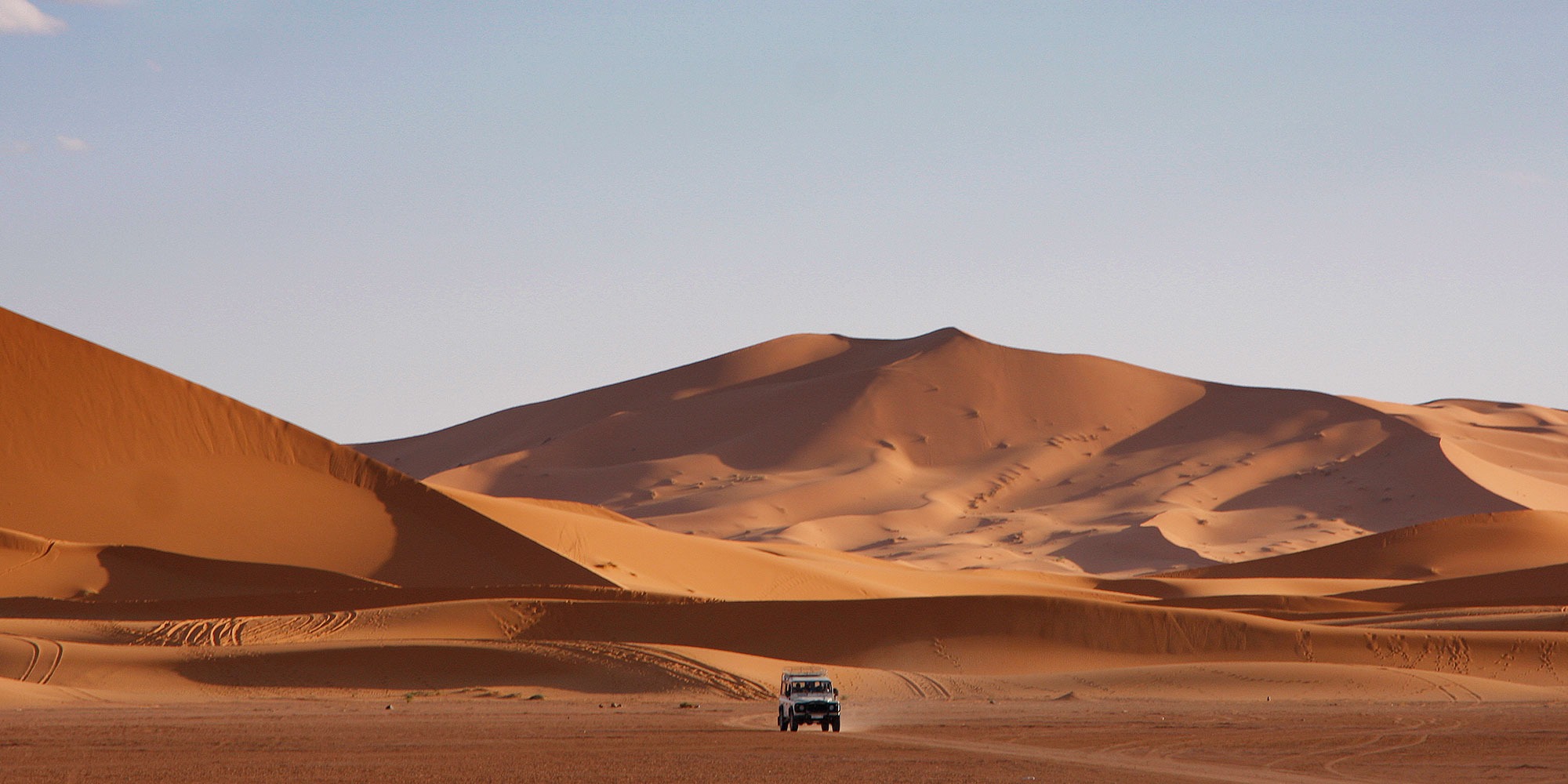 4X4 driving through Sahara desert, Merzouga, Morocco
