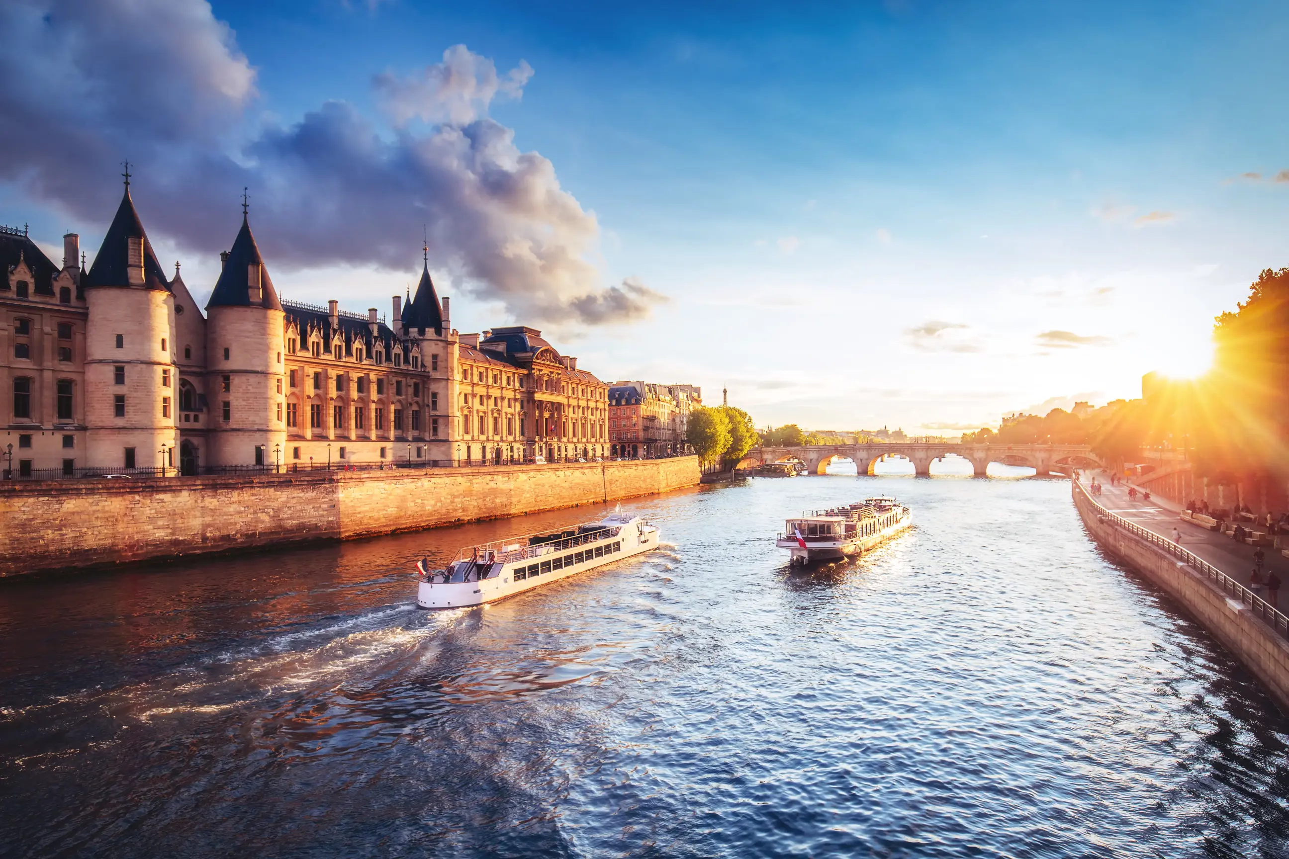 day-hero-dramatic-sunset-over-river-seine-in-paris-france.webp