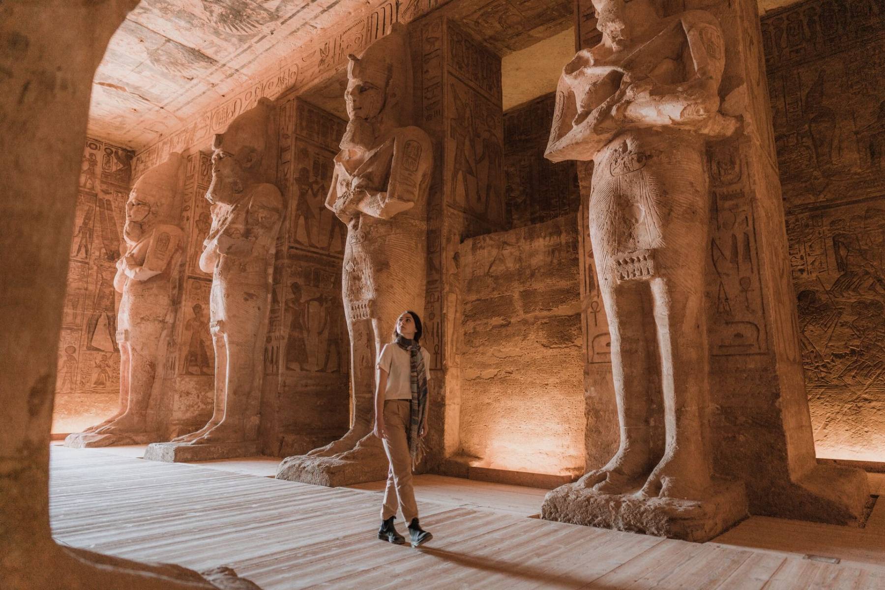 Woman walking inside Abu Simbel Temples