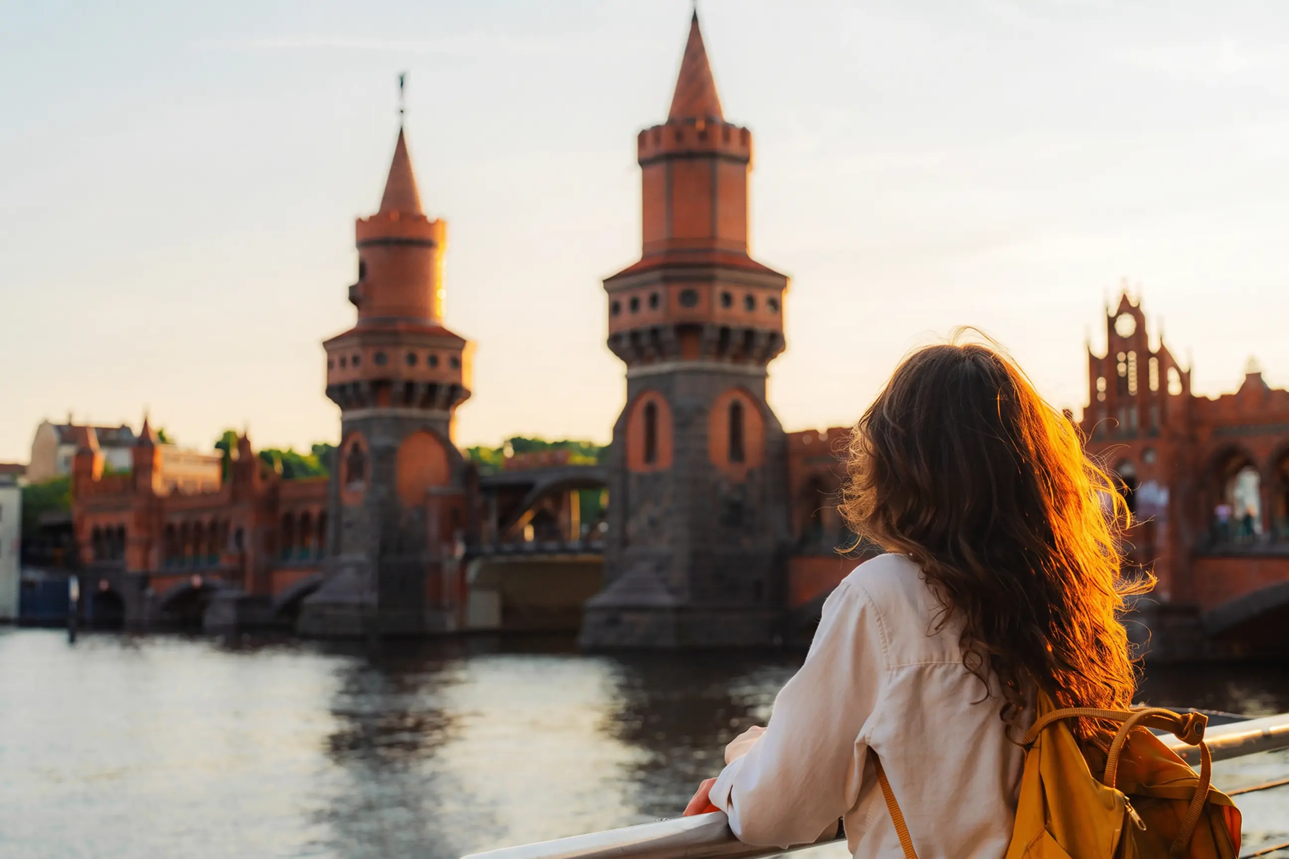 day-hero-sunset-near-oberbaumbrucke-bridge-berlin-germany.webp