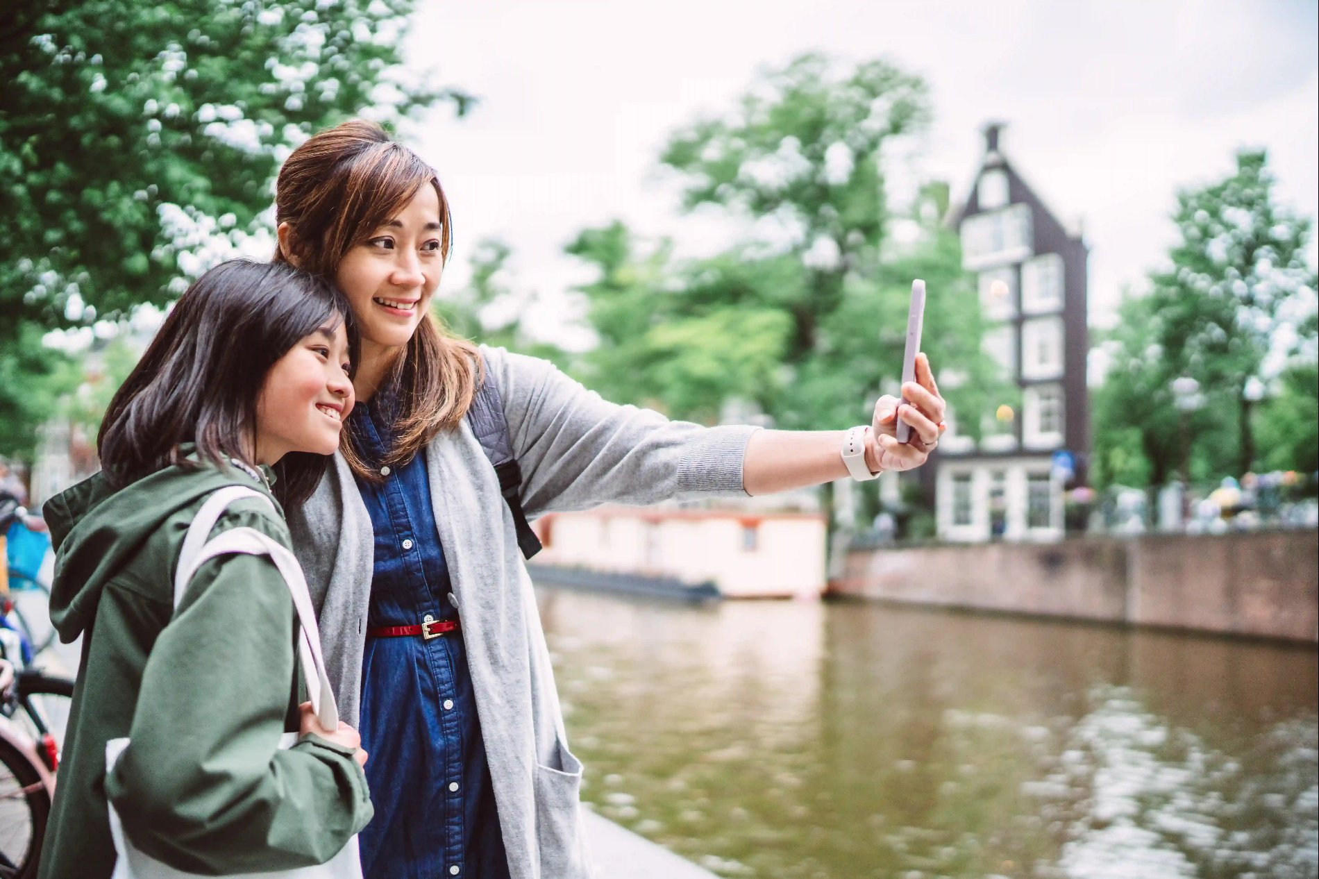 Mom Taking Selfie With Her Teenage Daughter
