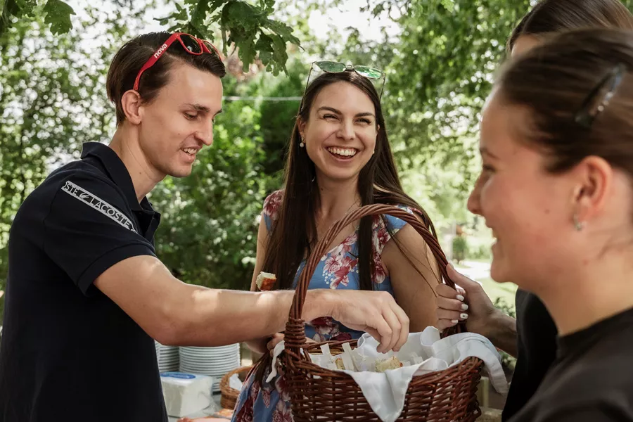 Couple laughing while at a food tasting in the Balkans