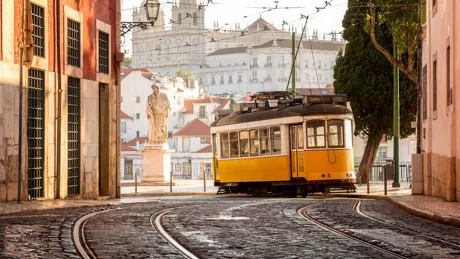 A yellow tram in Lisbon, Portugal