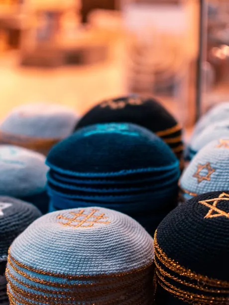 High Angle view of skull caps for sale in store High Angle view of skull caps for sale in store