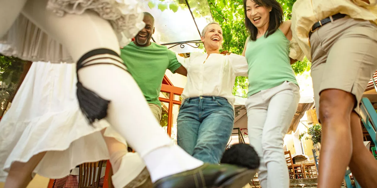 Traditional Dancing In Greece With Guests