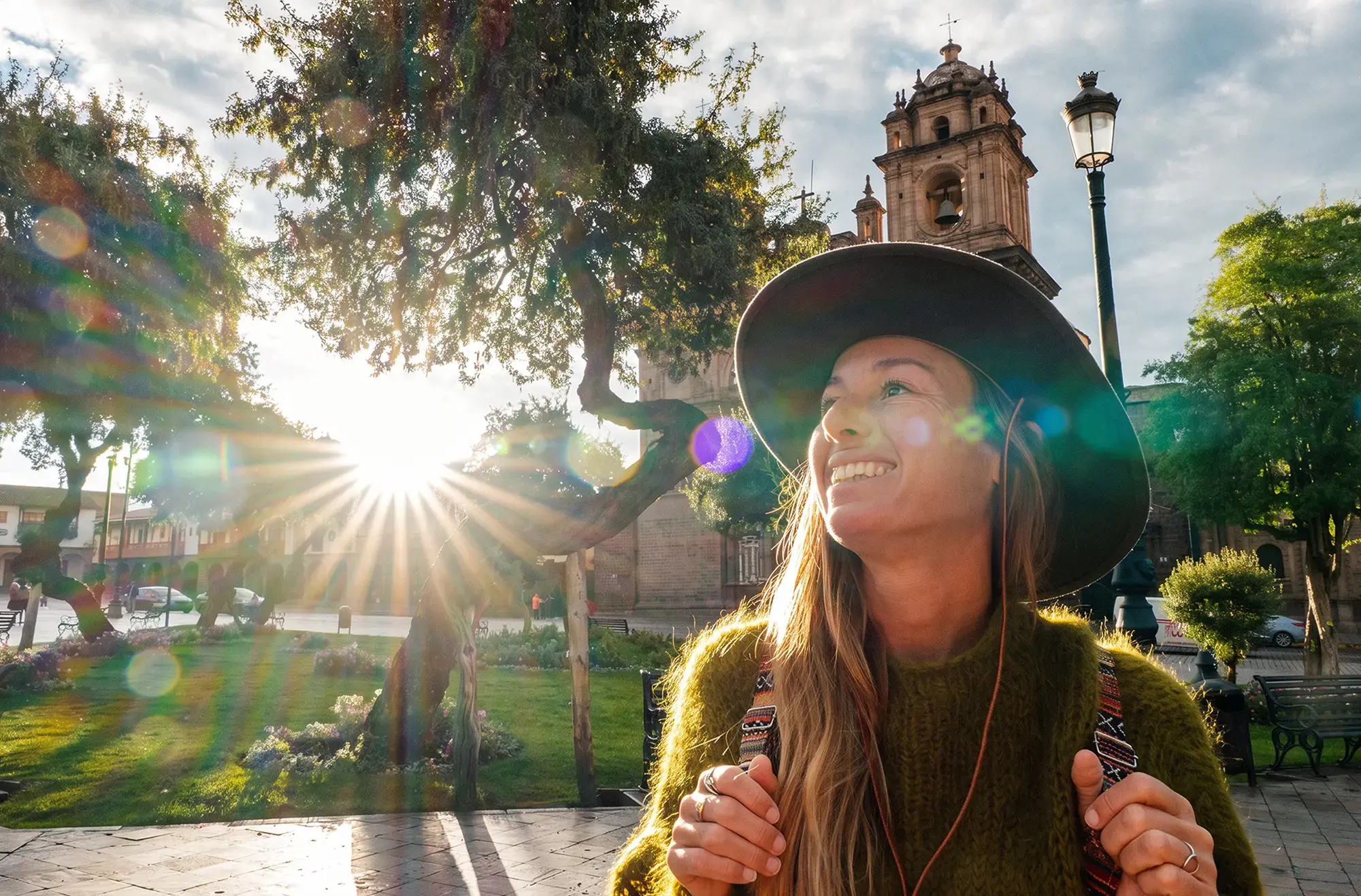 day-hero-woman-smiling-in-front-of-historic-cathedral-cusco-peru-2206620814.webp